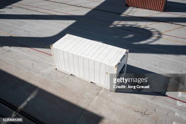 white container at container port - cargo containers stock pictures, royalty-free photos & images