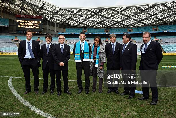 John Aloisi and Cathy Freeman pose with the FIFA inspection team delegates during the FIFA Australian Inspection Tour at Stadium Australia on July...