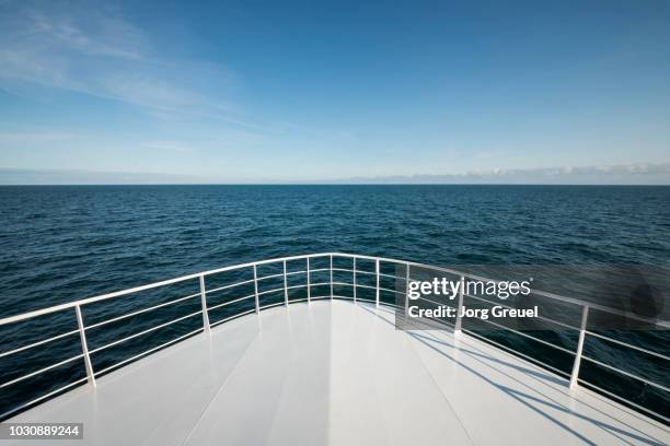 the bow of a ship in the north sea - ships bow stock pictures, royalty-free photos & images