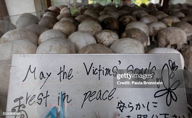 Sign left by the Japanese Red Cross at the Choeung Ek Genocidal Center where 8,000 human skulls sit in a glass case July 26, 2010 in Phnom Penh...