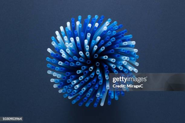 a bundle of drinking straw - group c imagens e fotografias de stock