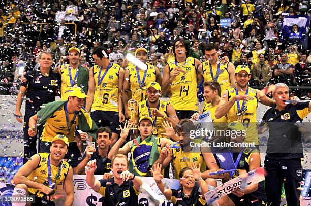 Brazil team celebrate their victory against Russia and the first placeat 2010 FIVB World League at Orfeo Superdomo Stadium on July 25, 2010 in...