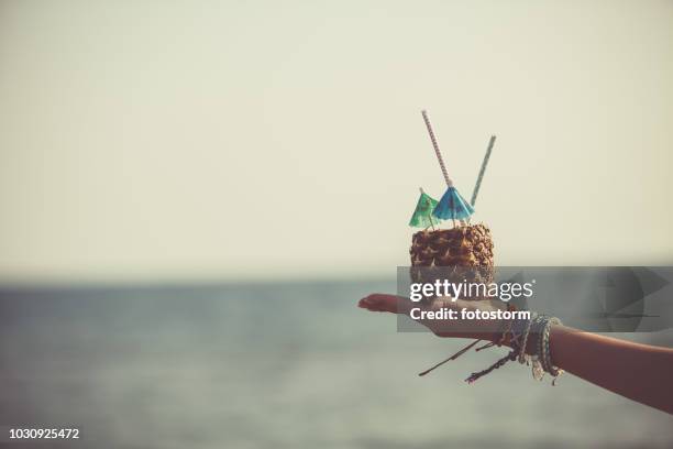 refreshing tropical drink - cocktail umbrella stock pictures, royalty-free photos & images