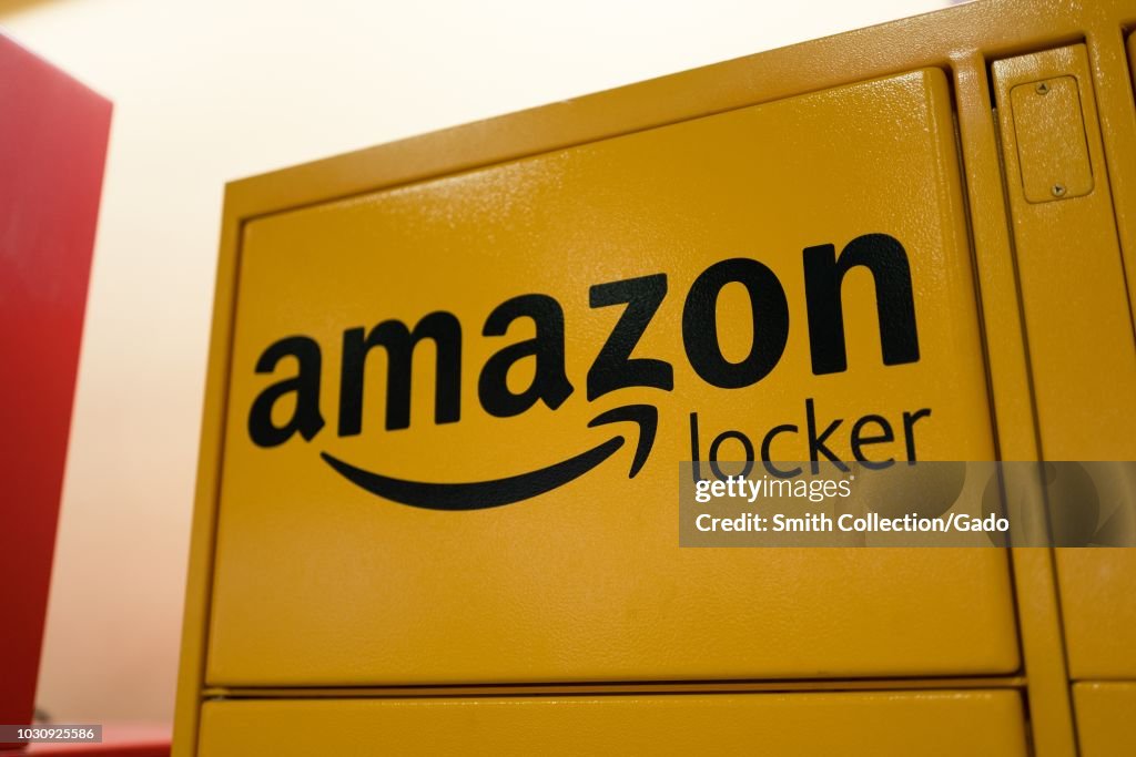 Close-up of logo on yellow Amazon locker, which allows for delivery ...