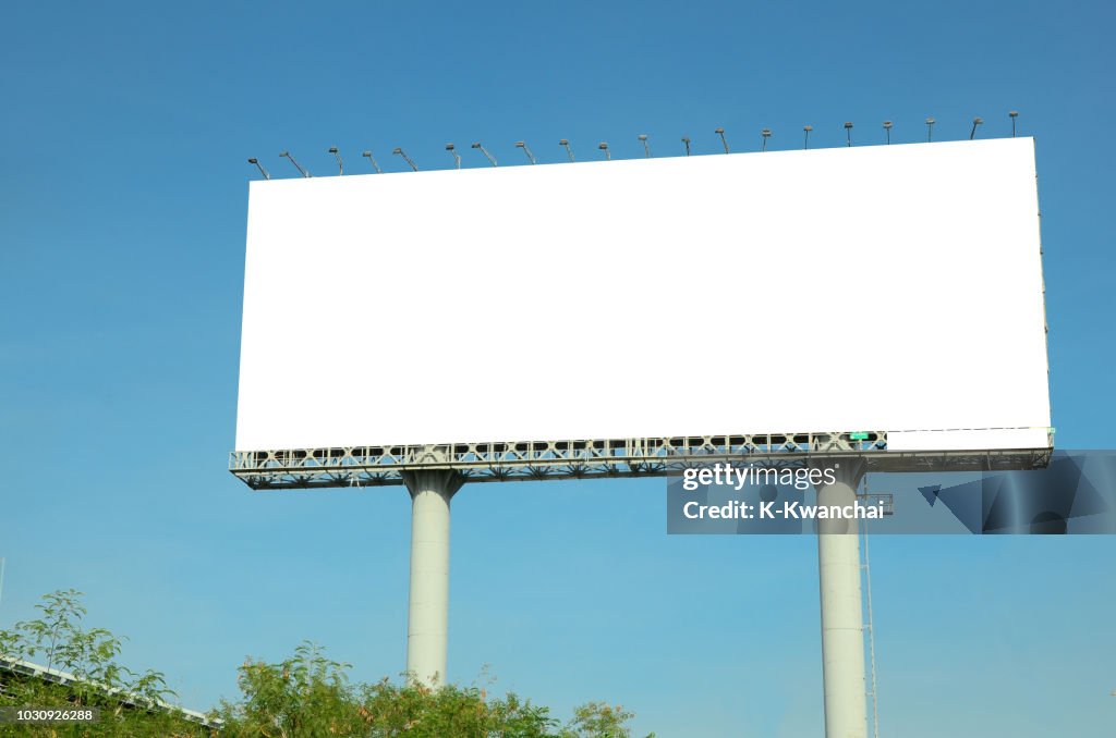 Low Angle View Of Billboard Against Clear Blue Sky