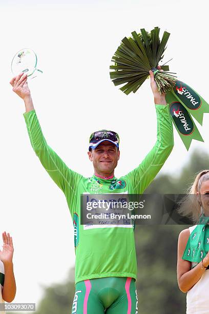 Alessandro Petacchi of Lampre Farnisi celebrates winning the Sprinters jersey on the podium after the twentieth and final stage of Le Tour de France...