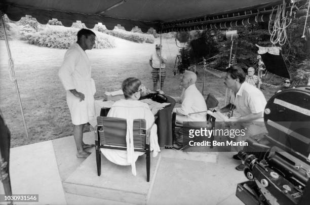 American actor Burt Lancaster on the set of 'The Swimmer' with its authors John Cheever and Cornelia Otis Skinner, July 27, 1966.