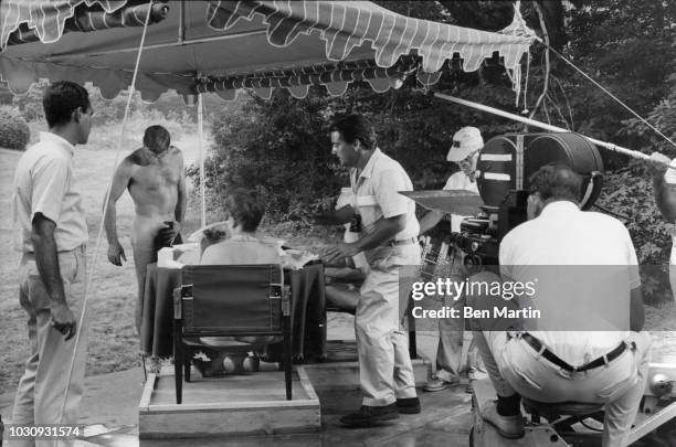 American actor Burt Lancaster on the set of 'The Swimmer' with its authors John Cheever and Cornelia Otis Skinner in Westport, CT, July 27, 1966.