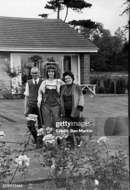 Judy Carne , English comedienne and actress, recuperating in a 'halo brace' at home with her parents, Harold and Kathy Botterill in Chapel Brampton,...