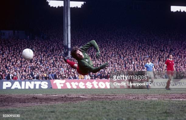 Ray Clemence of Liverpool makes a dramatic dive during an English League Division One match between Manchester City and Liverpool in the 1970's at...