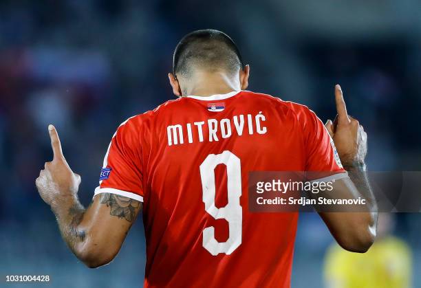 Aleksandar Mitrovic of Serbia celebrates after scores the goal during the UEFA Nations League C group four match between Serbia and Romania at...