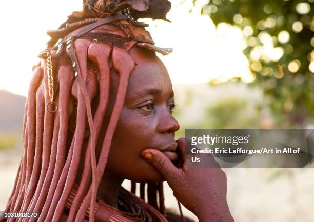 Thoughtful himba tribe woman, Cunene Province, Oncocua, Angola on July 13, 2018 in Oncocua, Angola.