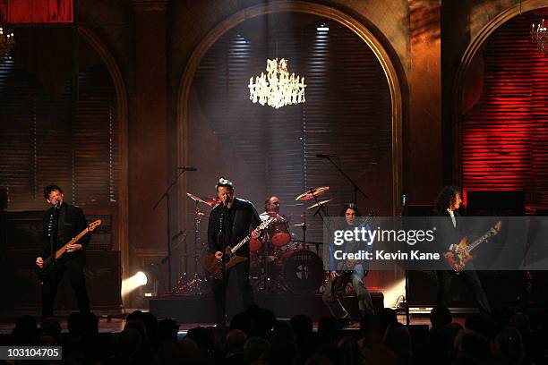Jason Newsted, James Hetfield, Lars Ulrich, Robert Trujillo and Kirk Hammett of Metallica perform onstage at the 24th Annual Rock and Roll Hall of...