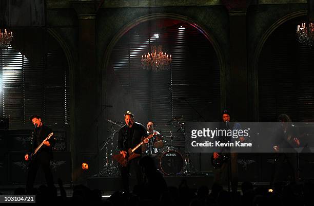 Jason Newsted, James Hetfield, Lars Ulrich, Robert Trujillo and Kirk Hammett of Metallica perform onstage at the 24th Annual Rock and Roll Hall of...