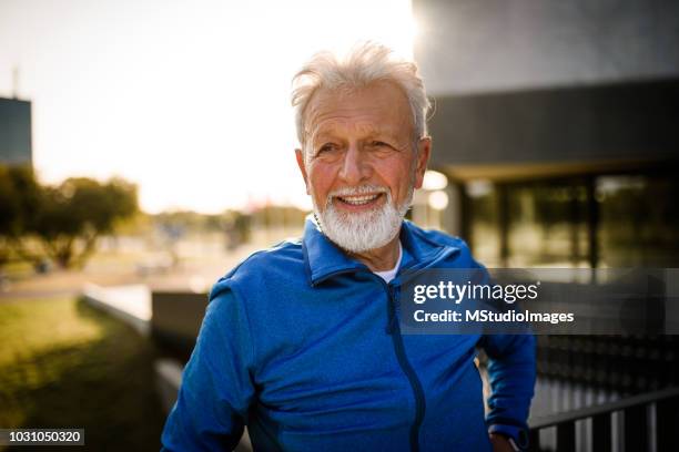 portrait of a smiling senior man. - active lifestyle overweight stock pictures, royalty-free photos & images