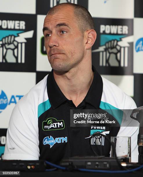 Warren Tredrea of the Port Adelaide Power talks to the media as he announces his AFL retirement at the Port Adelaide headquarters on July 27, 2010 in...