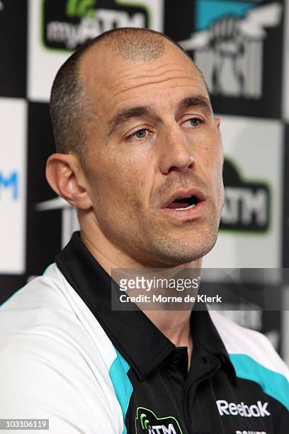 Warren Tredrea of the Port Adelaide Power talks to the media as he announces his AFL retirement at the Port Adelaide headquarters on July 27, 2010 in...
