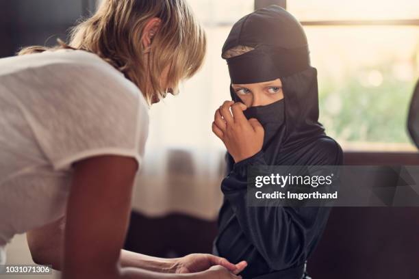 little boy preparing for halloween - ninja kid stock pictures, royalty-free photos & images