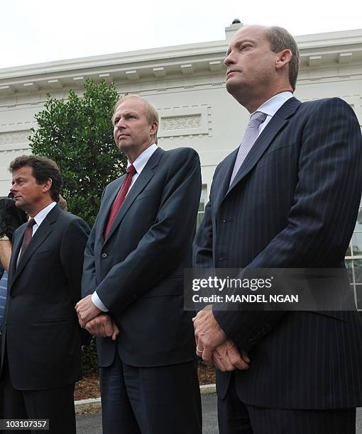 Chief Executive Tony Hayward , BP Managing Director Bob Dudley and BP America Chairman and President Lamar McKay watch as BP Chairman Carl-Henric...