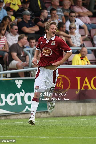 Michael Jacobs of Northampton Town celebrates after scoring his and his sides second goal during the pre season match between Northampton Town and...