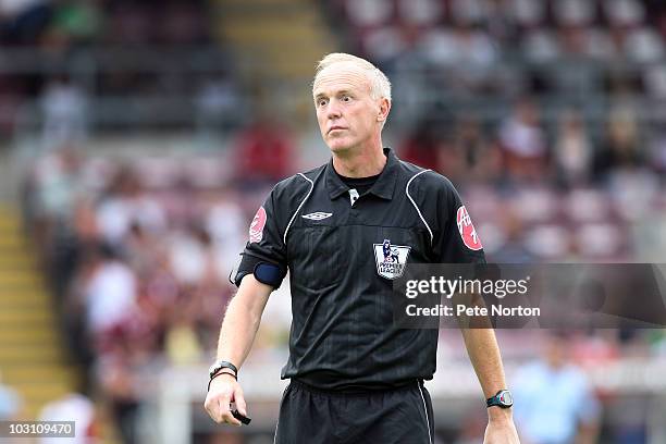 Referee Pete Walton in action during the pre season match between Northampton Town and Watford at Sixfields Stadium on July 24, 2010 in Northampton,...