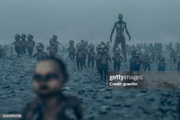 master zombie with walking dead zombie children - group of people running stock pictures, royalty-free photos & images