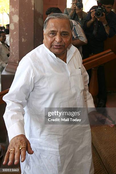 Samajwadi party chief Mulayam Singh Yadav arrives at the parliament house at the first day of the monsoon session in New Delhi on July 26, 2010.