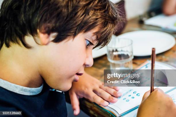 134 Kid Doing Crossword Puzzle Stock Photos High Res Pictures and 134 Kid Doing Crossword Puzzle Stock Photos High Res Pictures and