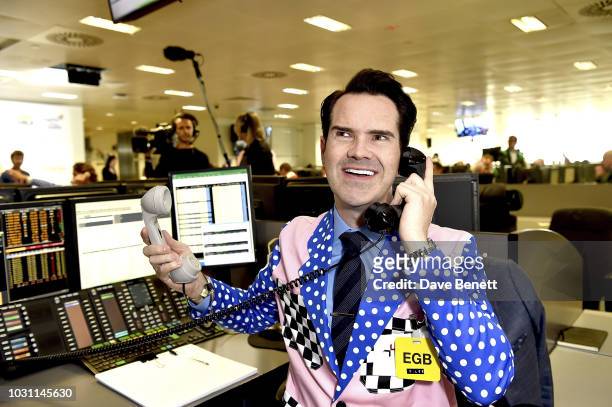 Jimmy Carr makes a trade at the BGC Charity Day at One Churchill Place on September 11, 2018 in London, England.