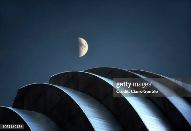 moon over the kaufmann center - kansas city missouri stock pictures, royalty-free photos & images