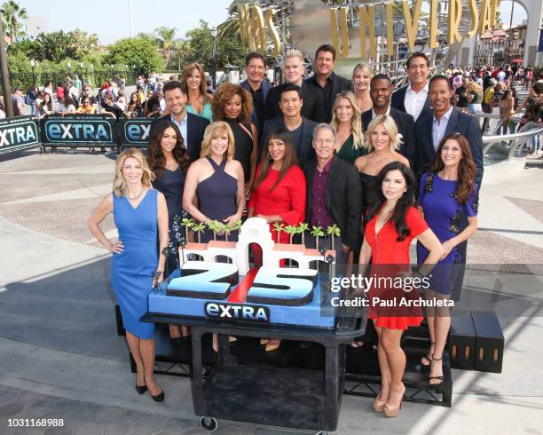 All of the Hosts past and present pose at the 25th anniversary celebration of "Extra" at Universal Studios Hollywood on September 10, 2018 in...