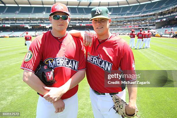 American League All-Star Trevor Cahill and Andrew Bailey of the Oakland Athletics stand on the field prior during the 81st MLB All-Star Game at Angel...