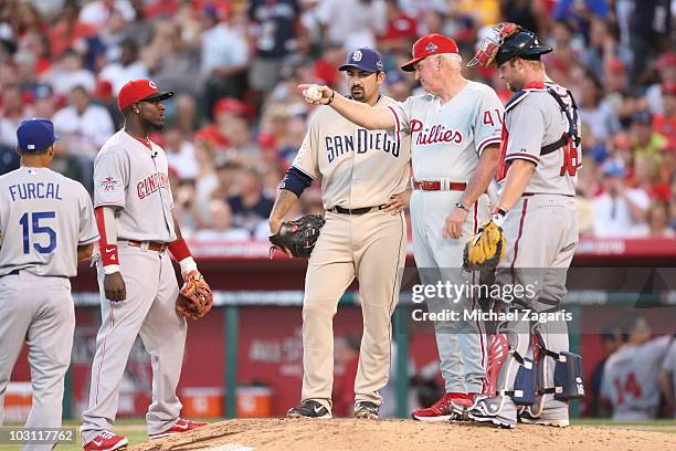 National League All-Star coach Charlie Manuel of the Philadelphia Phillies making a pitching change during the 81st MLB All-Star Game at Angel...