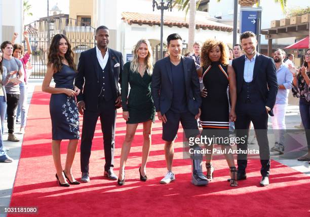 Personalities Terri Seymour, A.J. Calloway, Renee Bargh, Mario Lopez, Tanika Ray and Mark Wright attend the 25th anniversary celebration of "Extra"...