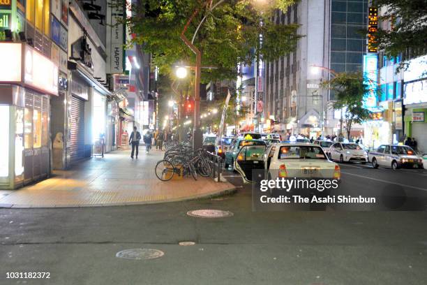 Taxis queue while waiting for customers at Susukino district on September 11, 2018 in Sapporo, Hokkaido, Japan. A male resident in Atsuma who was the...