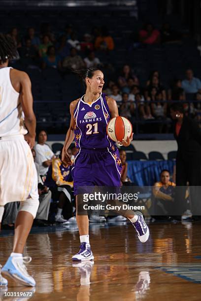 Ticha Penicheiro of the Los Angeles Sparks brings the ball up court during the WNBA game against the Chicago Sky on July 16, 2010 at the All-State...