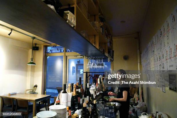 Ramen shop saves energy by not turning off some lights on September 10, 2018 in Sapporo, Hokkaido, Japan. Commuters hit the streets of the Hokkaido...