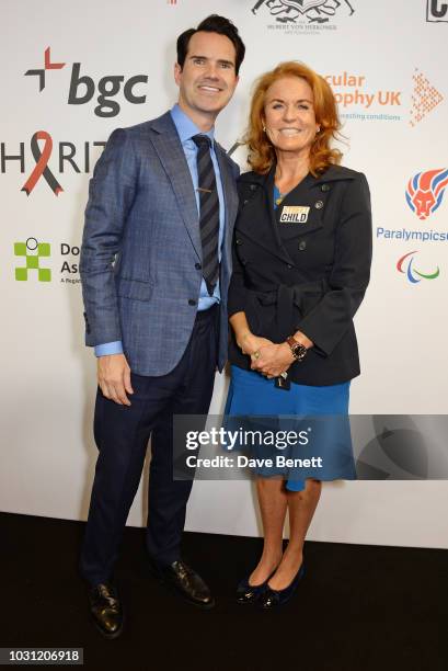 Jimmy Carr and Sarah Ferguson, Duchess of York, representing Street Child, speak onstage at BGC Charity Day at One Churchill Place on September 11,...