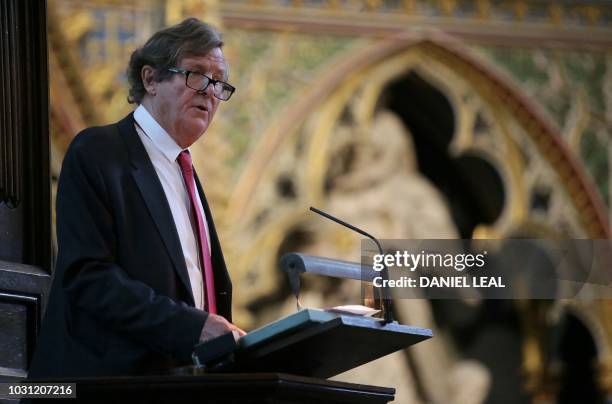 English playwright David Hare speaks during a service of thanksgiving for the late English theatre, opera and film director, Peter Hall, at...