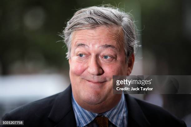British actor and comedian Stephen Fry arrives at Westminster Abbey for a memorial service for theatre great Sir Peter Hall OBE on September 11, 2018...