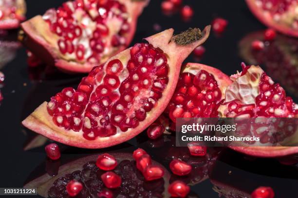 pomegranate slices - pomegranate stock pictures, royalty-free photos & images