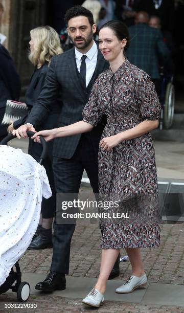 Rebecca Hall, daugter of the late Peter Hall, and her husband Morgan Spector leave from Westminster Abbey in central London on September 11 after...