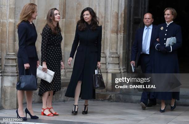 Nicki Frei , widow of Peter Hall, and their daughter Emma Hall , leave with Christopher Hall , from Westminster Abbey in central London on September...