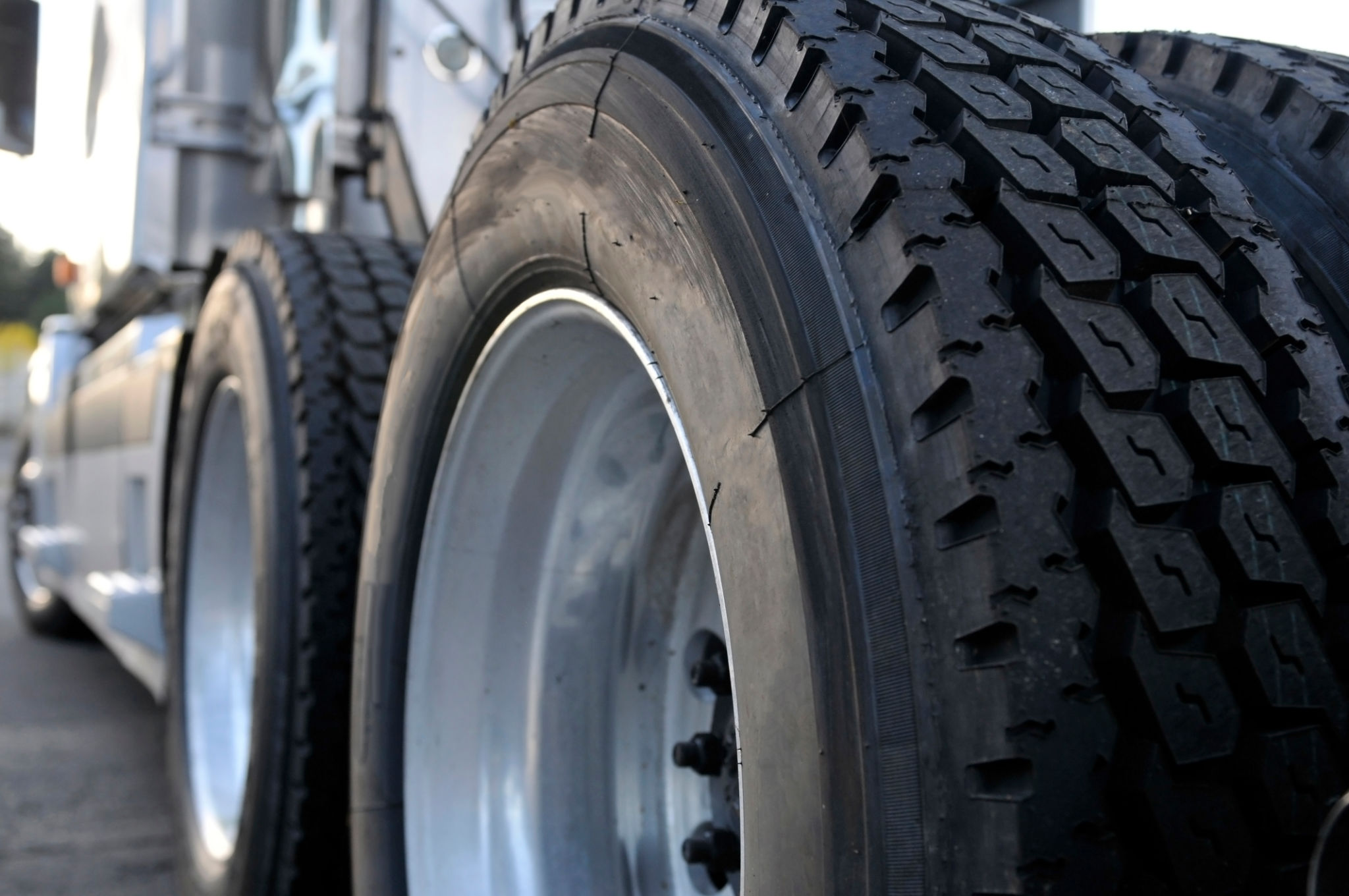 Big rig semi truck with huge wheels with tires Big rig semi truck with huge wheels with tires
