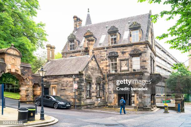 pearce lodge gatehouse at university of glasgow scotland uk - glasgow university stock pictures, royalty-free photos & images