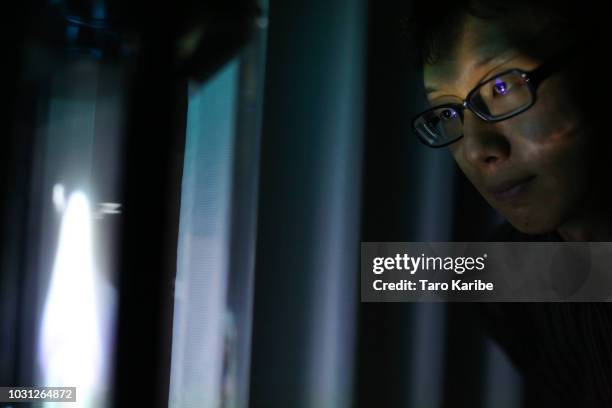 Akihiko Kondo stares at 'Hatsune Miku' before going to bed on September 11, 2018 in Tokyo, Japan. Akihiko Kondo, a 35 year-old school clerk living in...