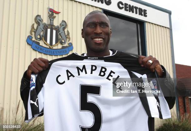 Sol Campbell poses with a Newcastle United shirt after signing for Newcastle United at The Little Benton training ground on July 28, 2010 in...