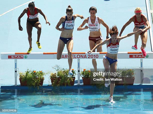 Sophie Duarte of France, Katarzyna Kowalska of Poland and Lyubov Kharlamova of Russia compete in the Womens 3000m Steeplechase Heat during day two of...