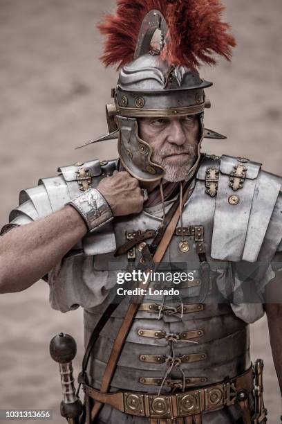 roman during a public performance - centurione stock pictures, royalty-free photos & images