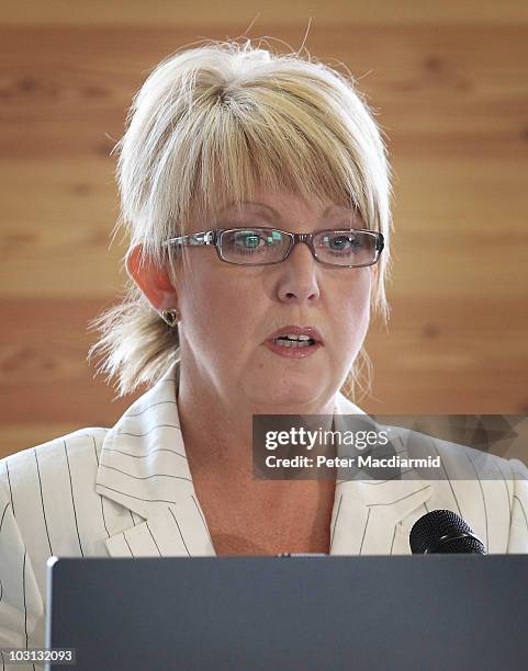 Baroness Newlove introduces Home Secretary Theresa May on July 28, 2010 in London, England. Speaking to community workers, police and reporters the...